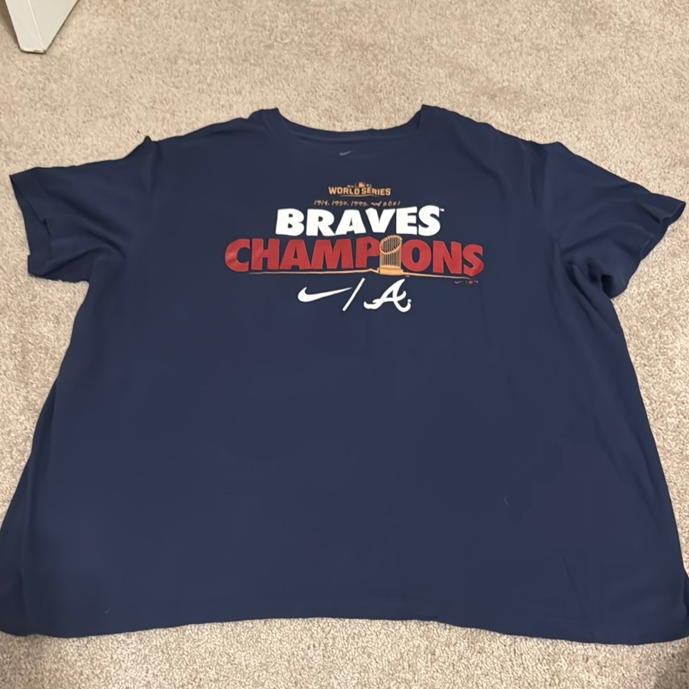 Nike Blue Braves Champions Short Sleeve Tee